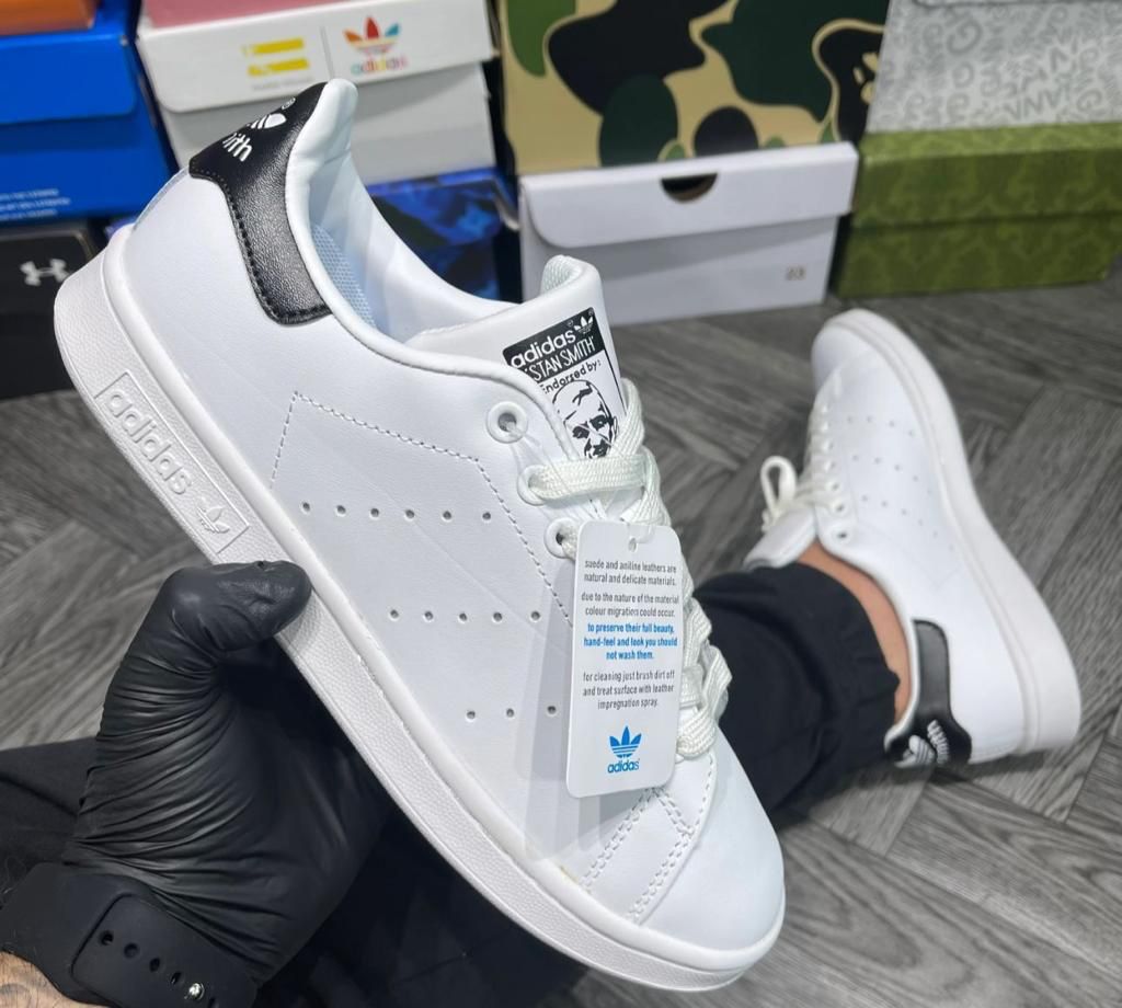 Stan smith blancas y negras online